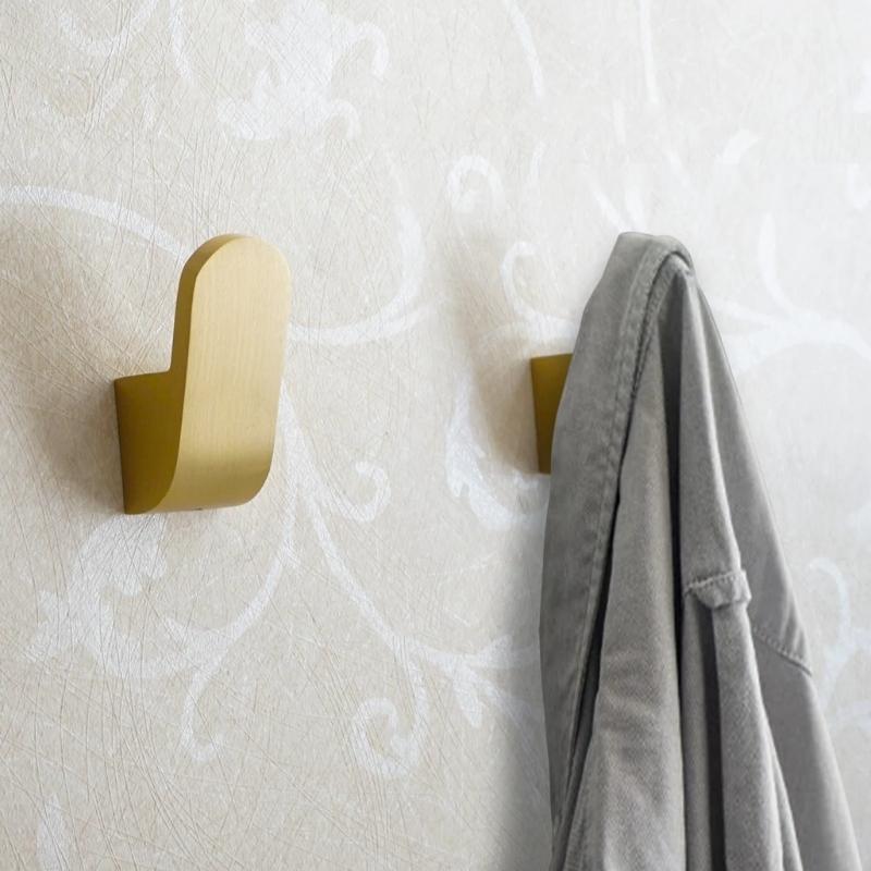 Modern golden brass wall hooks for bathrobes for compact and elegant hanging