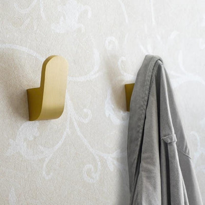 Modern golden brass wall hooks for bathrobes for compact and elegant hanging