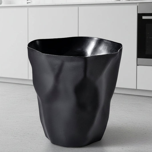 Stylish Minimalist Wastebasket with a Unique Irregular Shape