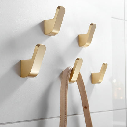 Modern golden brass wall hooks for bathrobes for compact and elegant hanging